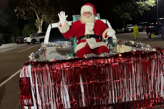 Fondren Santa in parade in back of truck