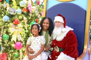 Santa with mom and daughter