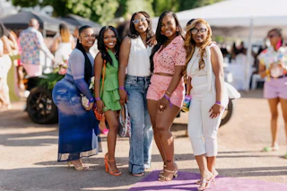 Group of five Black women posed