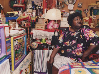 Mrs L V Hull Looking at Gift for B B King in Her Bedroom