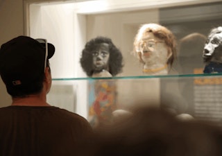 Man looking at exhibits MMA