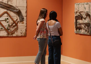 Women looking at art