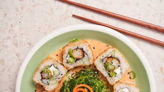 Sushi with chopsticks